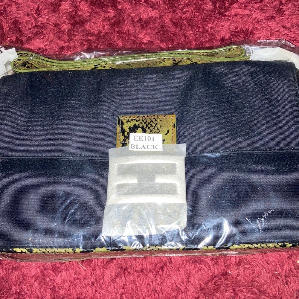 Black snake print shoulder bag